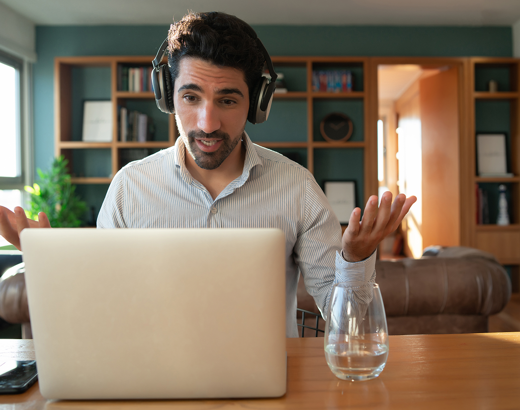 Team members smiling during an interactive all-hands session
