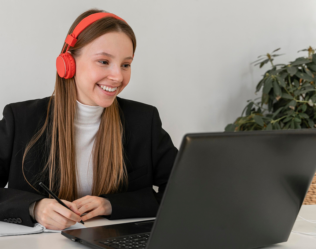 Team member with headphones participating in a meeting